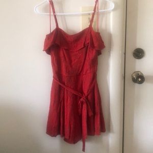 Red floral romper. Size XXS. Never worn.